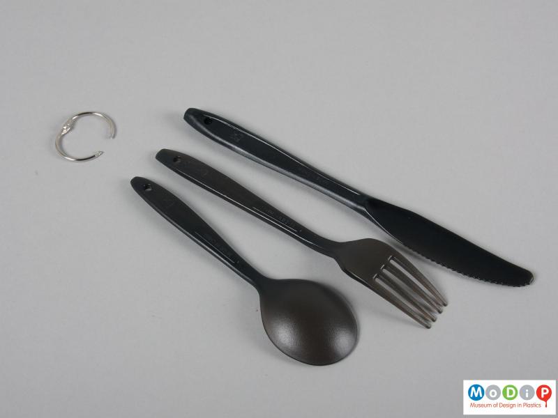 Underside view of a set of cutlery showing the pieces separated.