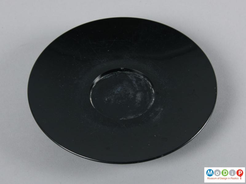 Top view of a saucer showing the recess for the cup.
