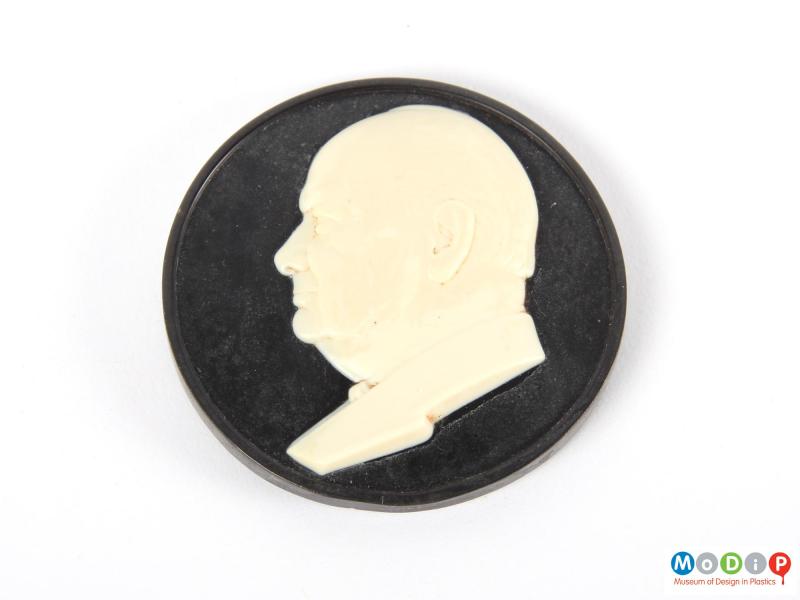 Top view of a cameo showing the white portrait.