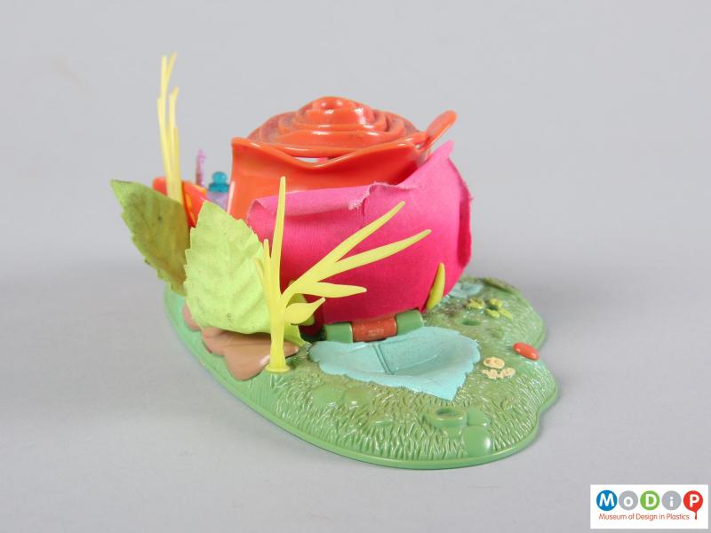 Side view of a Polly Pocket toy showing it closed.