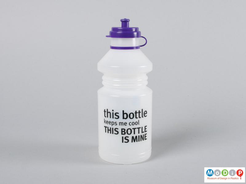 Side view of a bottle showing the printed lettering.