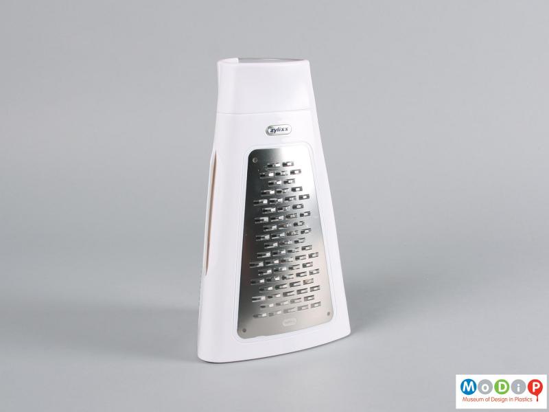 Side view of a grater showing the triangular shape.