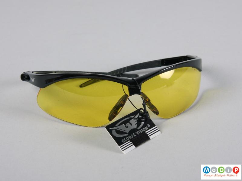 Front view of a pair of glasses showing the swing tag.