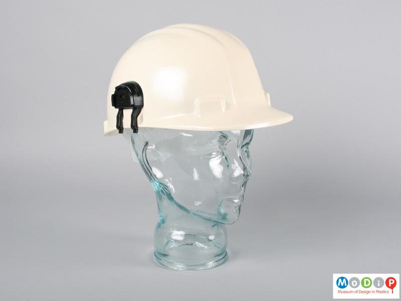 Side view of a safety hat showing the attachments.