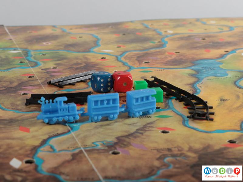 Close view of a board game showing some of the pieces.