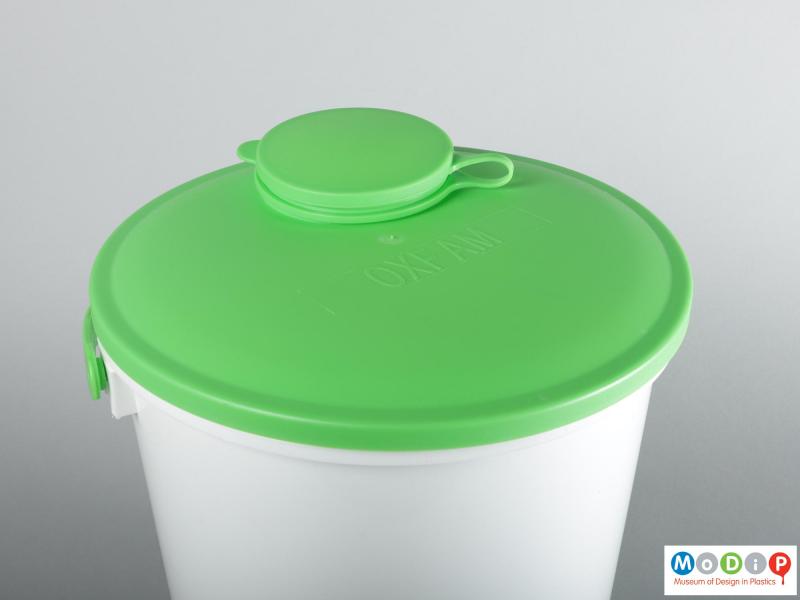 Close view of a bucket showing the lid.