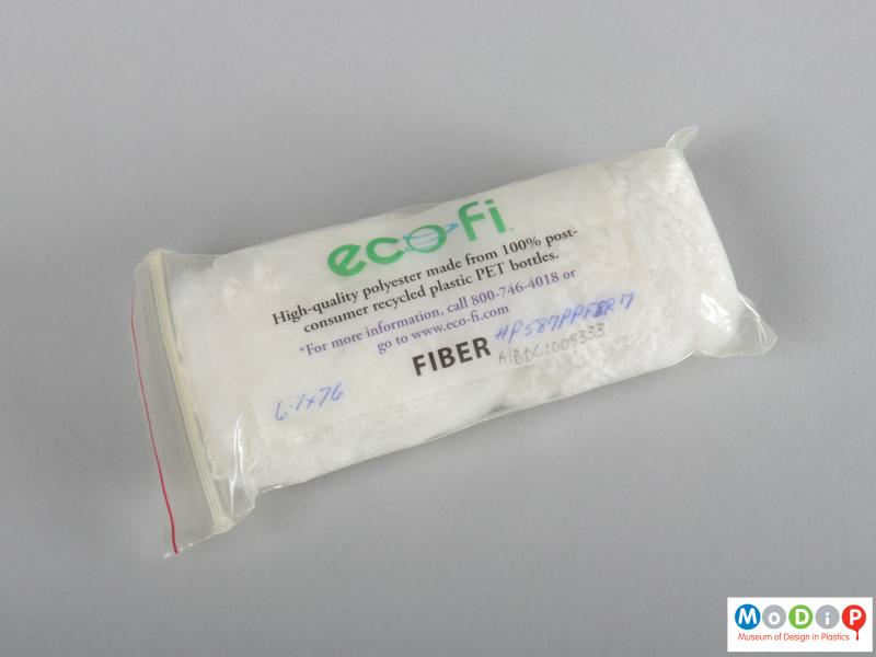 Side view of a PET fibre sample showing the packaging.