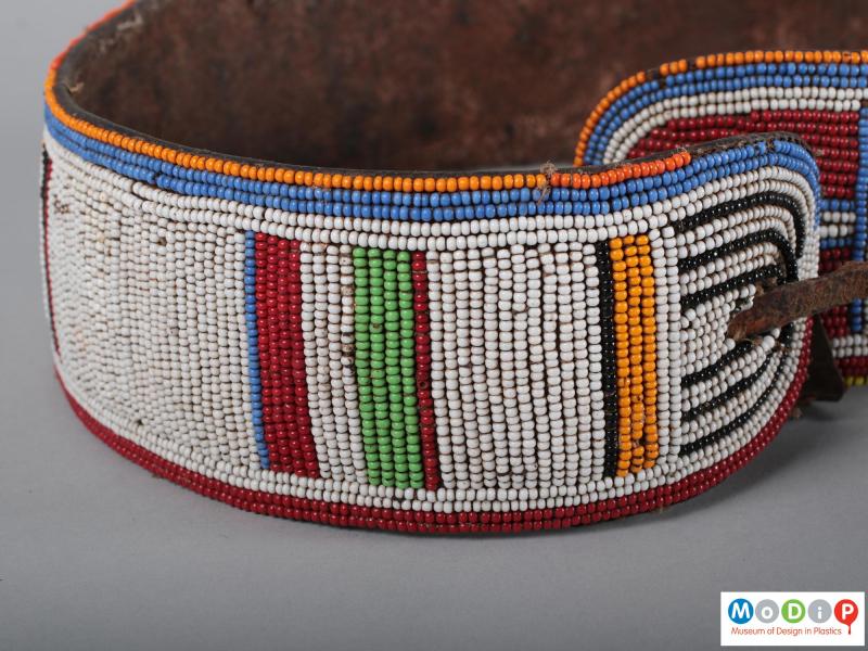 Close view of a belt showing the bead work.