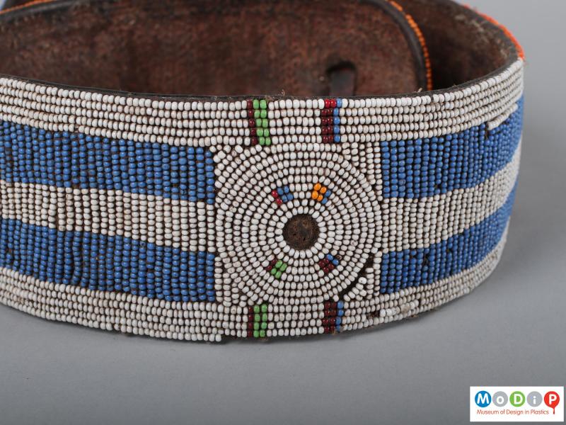 Close view of a belt showing the bead work.