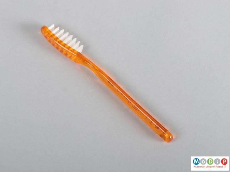 Side view of a toothbrush showing