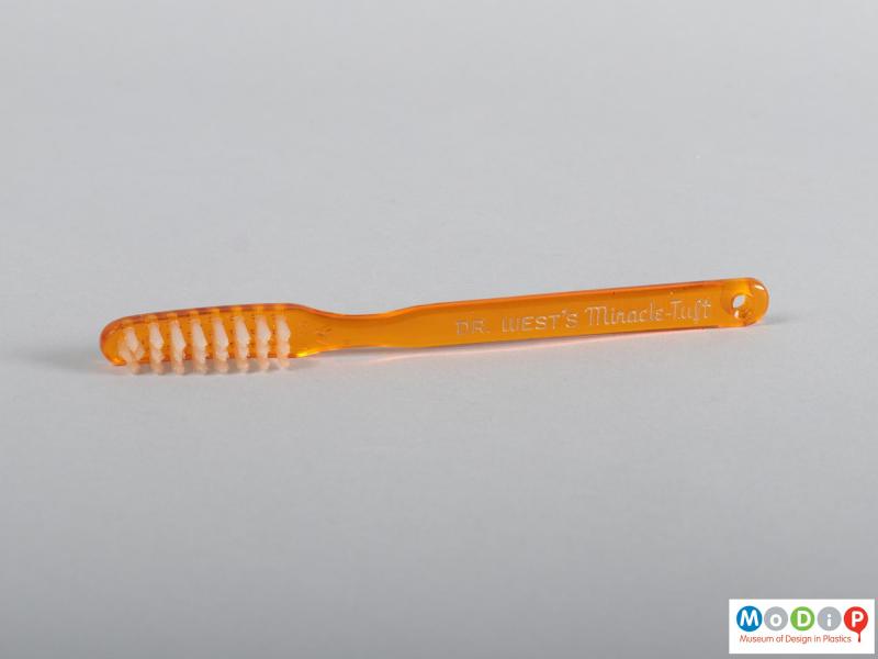 Side view of a toothbrush showing