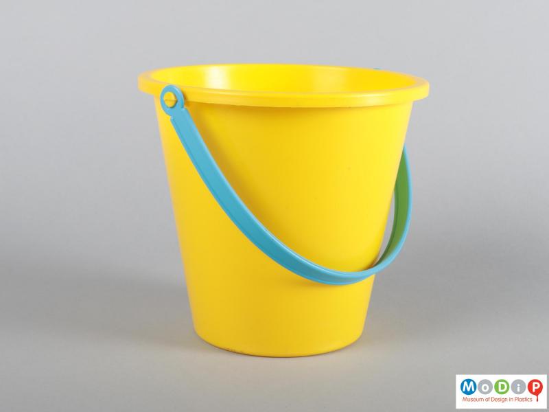 Side view of a bucket showing the handle.