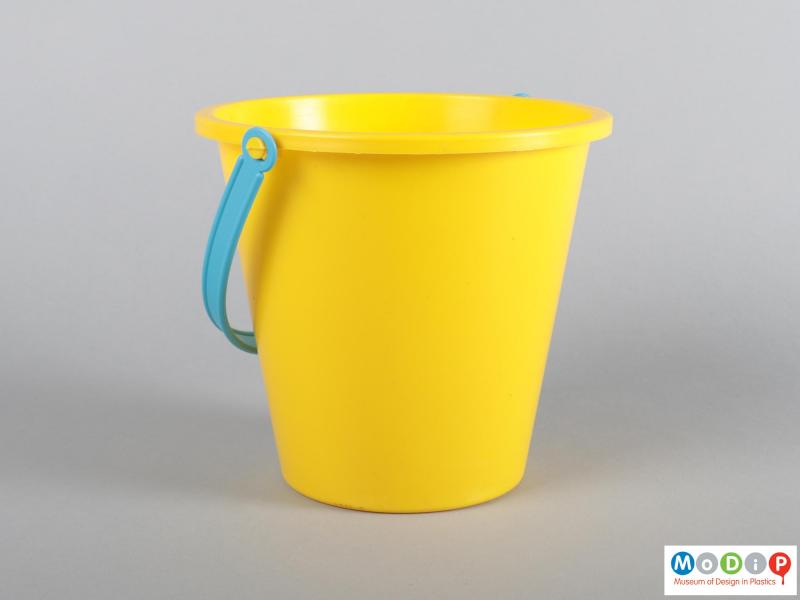 Side view of a bucket showing the handle.