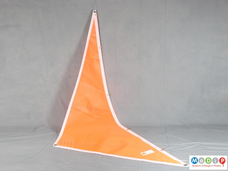 Side view of a sail showing the triangular shape.