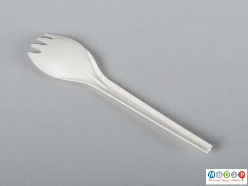 Underside view of a spork showing the hollow handle.