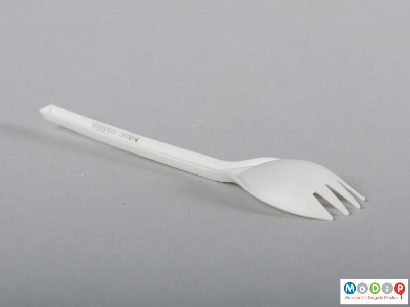 Side view of a spork showing the deep fork head.