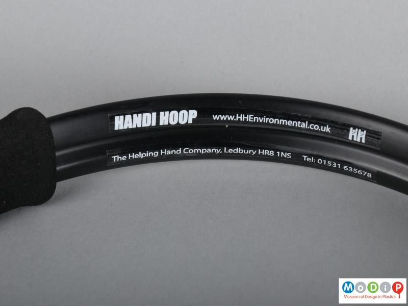 Close view of a Handihoop showing the self adhesive label.