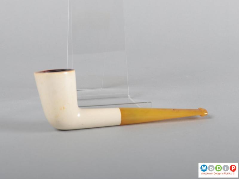 Side view of a smoking pipe showing the two colours.