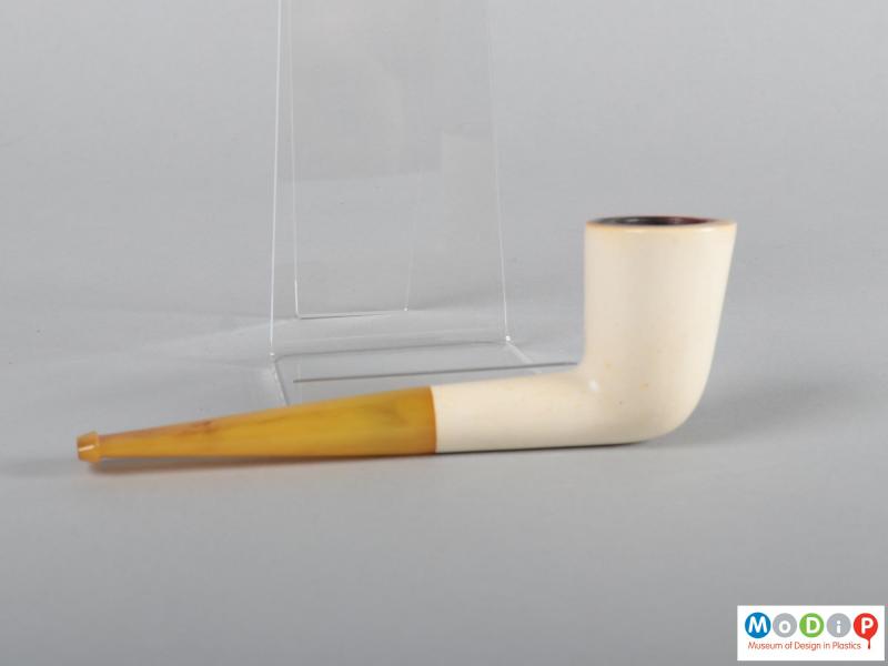 Side view of a smoking pipe showing the two colours.