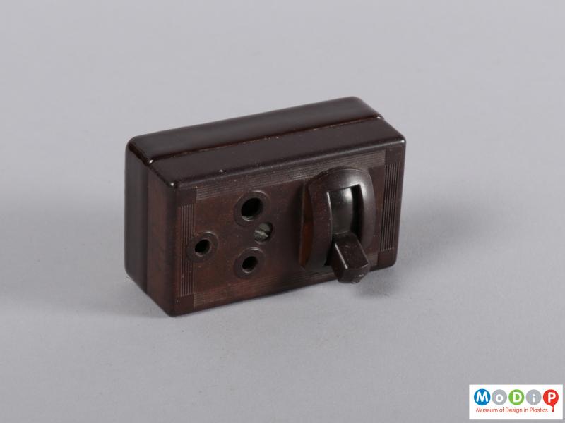 Front view of a wall socket showing the switch.