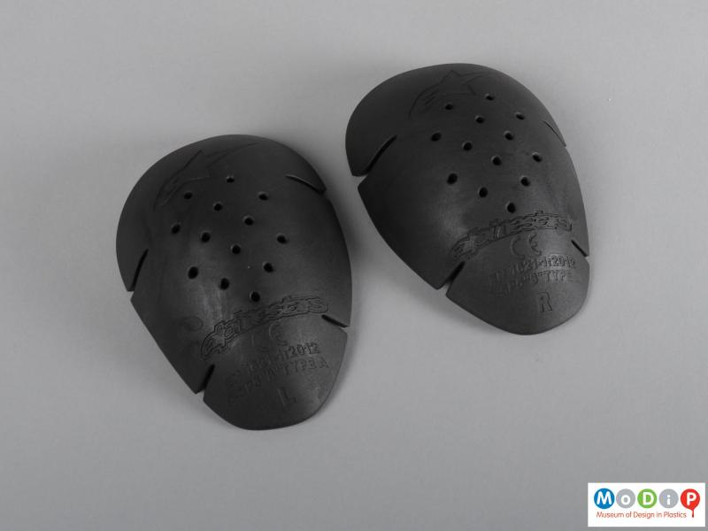 Top view of a set of protective pads showing the ovoid shape of the shoulder pads.