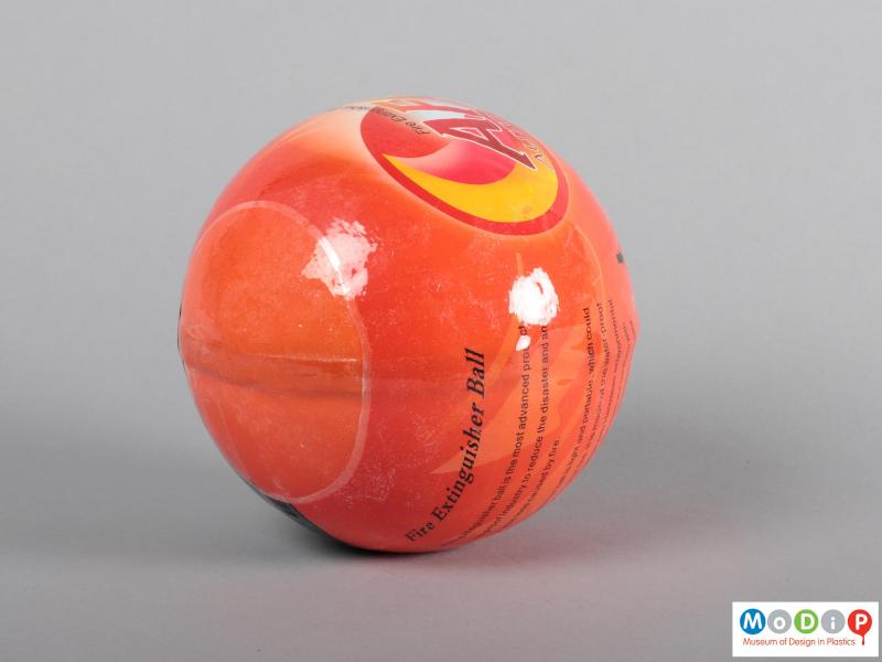 Side view of an extinguisher showing the spherical shape.