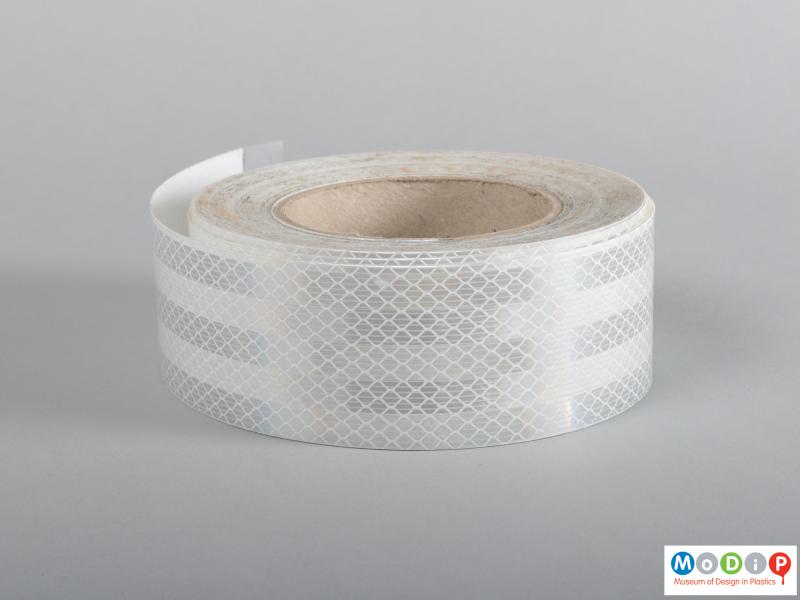 Side view of a roll of tape showing the patterning.