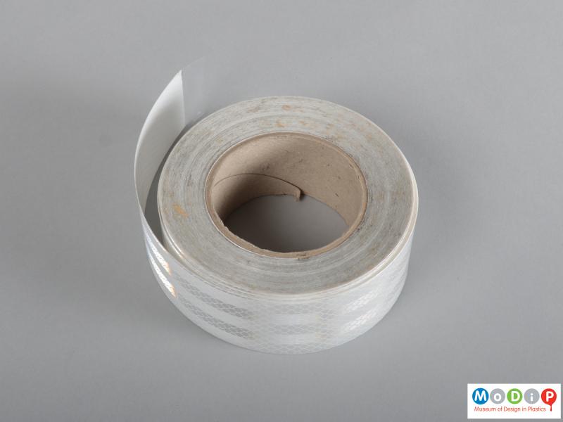 Top view of a roll of tape showing the thickness of the tape.