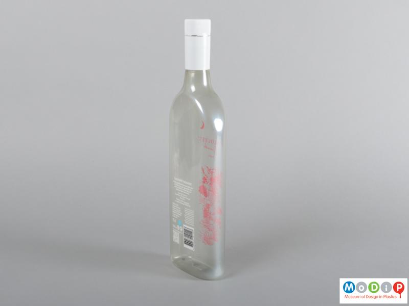 Side view of a bottle showing the slim profile.