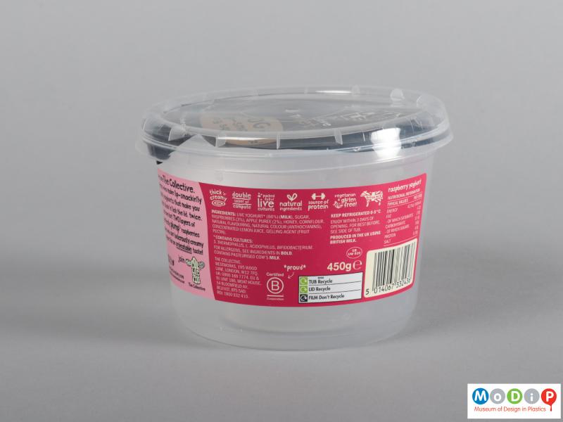 Side view of a yogurt pot showing the clear pot and lid.