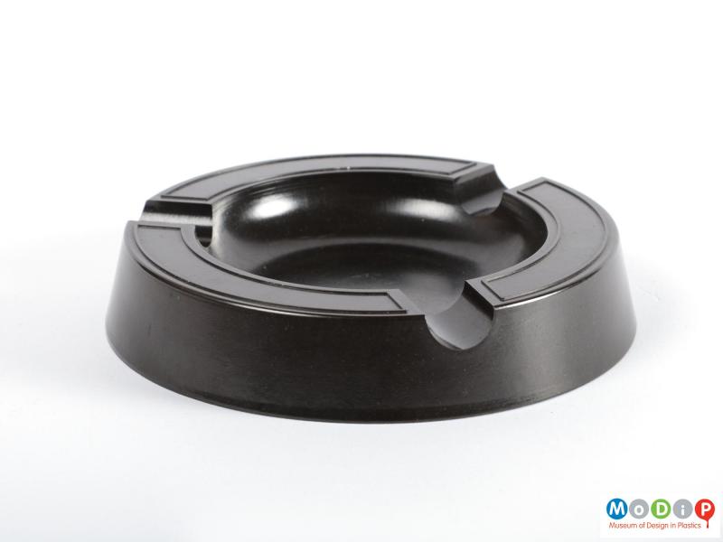 Side view of an ashtray showing the tapered sides.