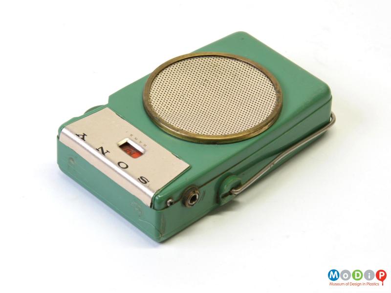 Front view of a radio showing the round speaker.