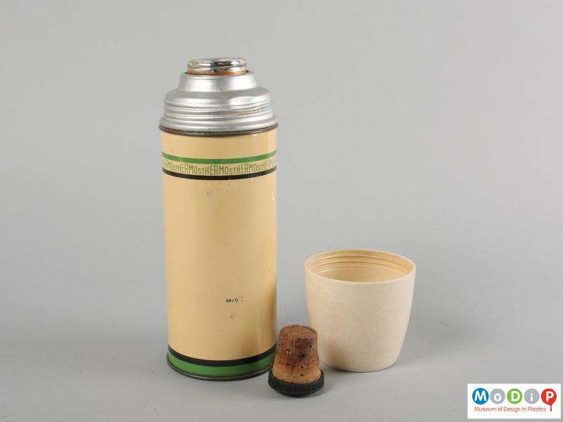 Side view of a flask showing the bung and cup.