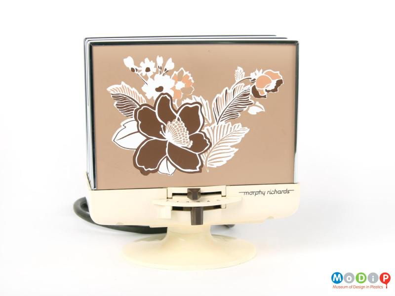 Front view of a Morphy Richards toaster showing the flower motif amd pedastal foot.