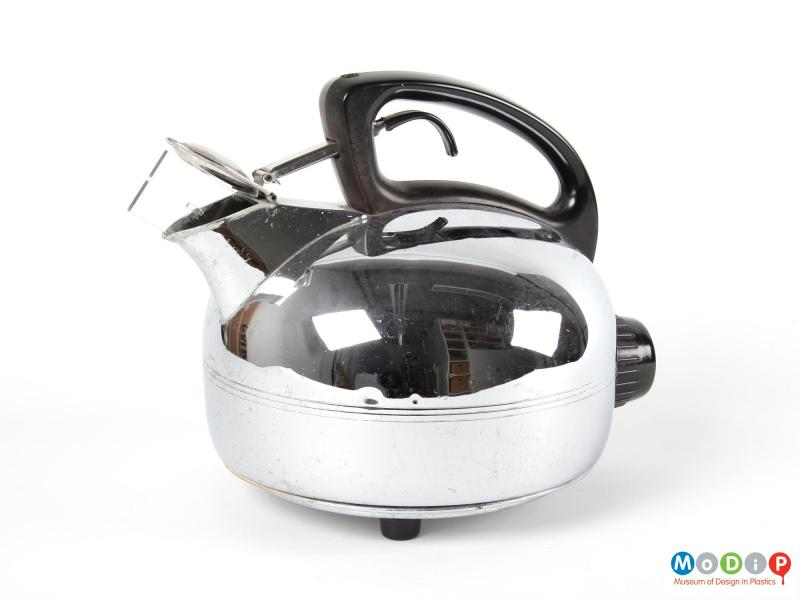 Side view of a Swan kettle showing the spout cover held open.