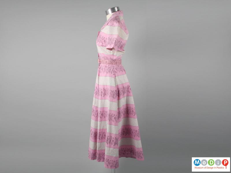 Side view of a dress showing the stripes.