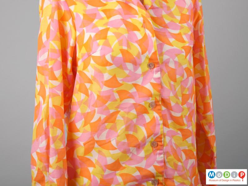 Close view of a blouse showing the printed pattern.