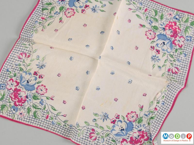 Close view of a handkerchief showing the printed pattern.