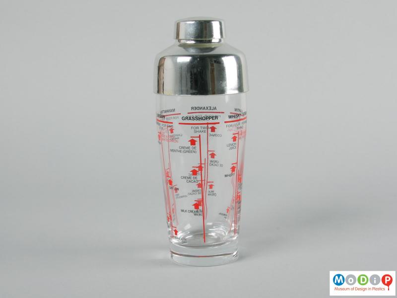 Side view of a cocktail shaker showing the printed information running around the surface.
