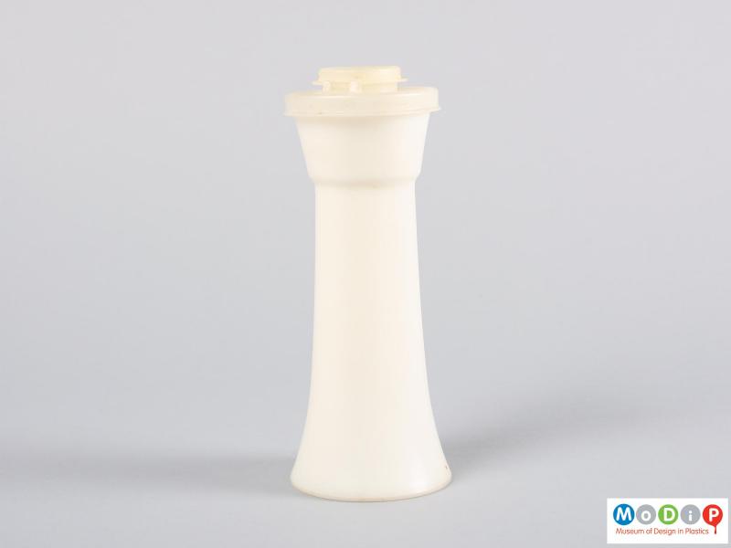 Rear view of a pepper shaker showing the fluted shape.