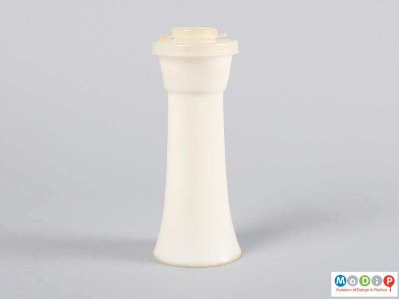 Rear view of a salt shaker showing the fluted shape.