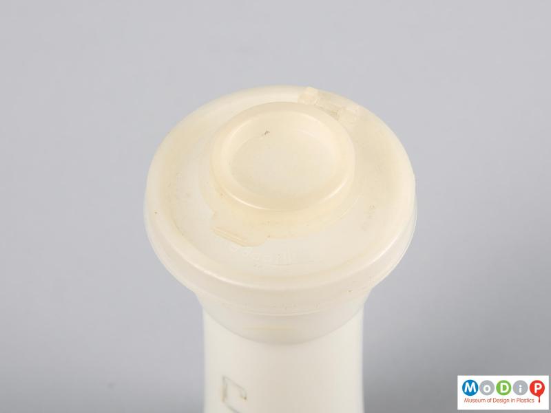 Top view of a salt shaker showing the hinged lid.