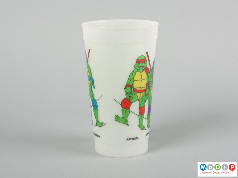 Side view of a beaker showing the printed design.