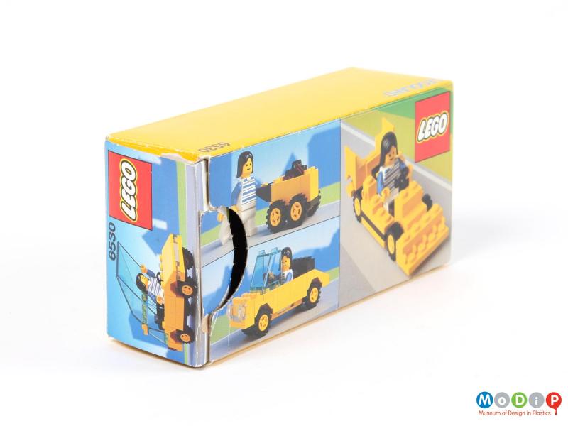 Side view of a toy car showing the packaging.
