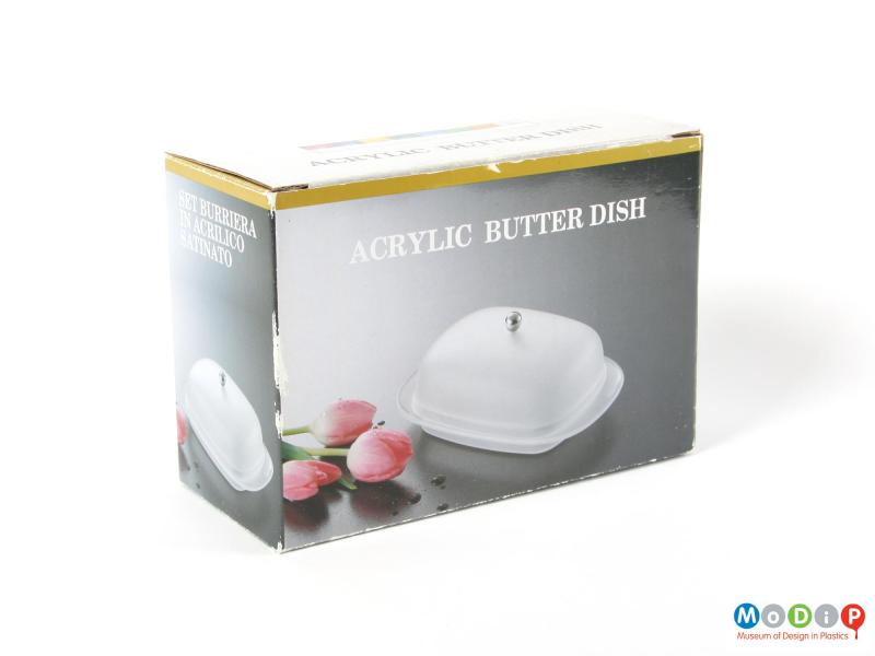 Side view of a butter dish showing the packaging.