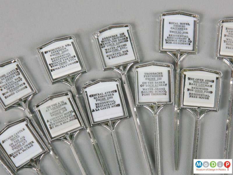 Close view of a set of cocktail sticks showing the information printed on the rear.