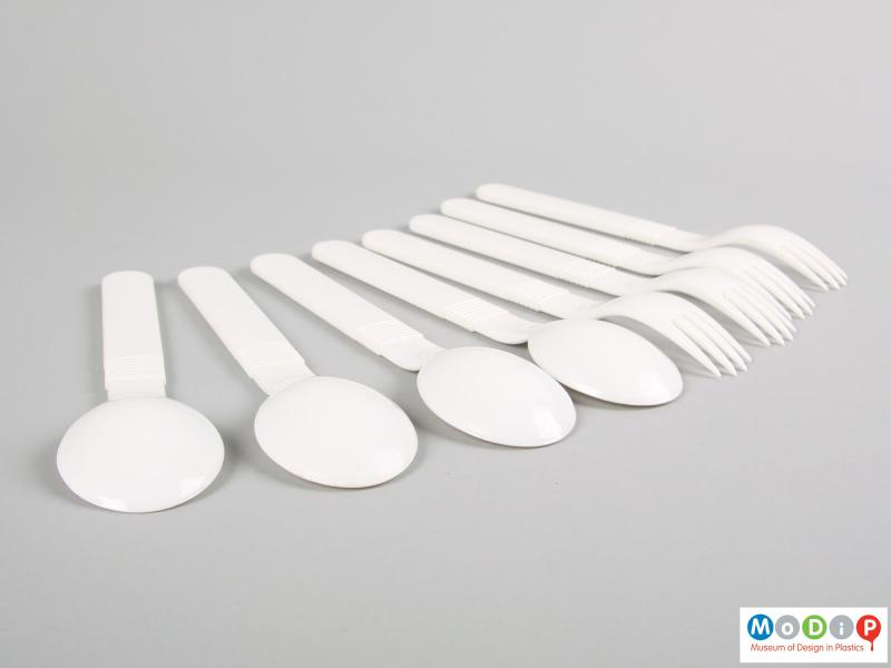 Side view of a cutlery set showing the large bowls on the spoons.