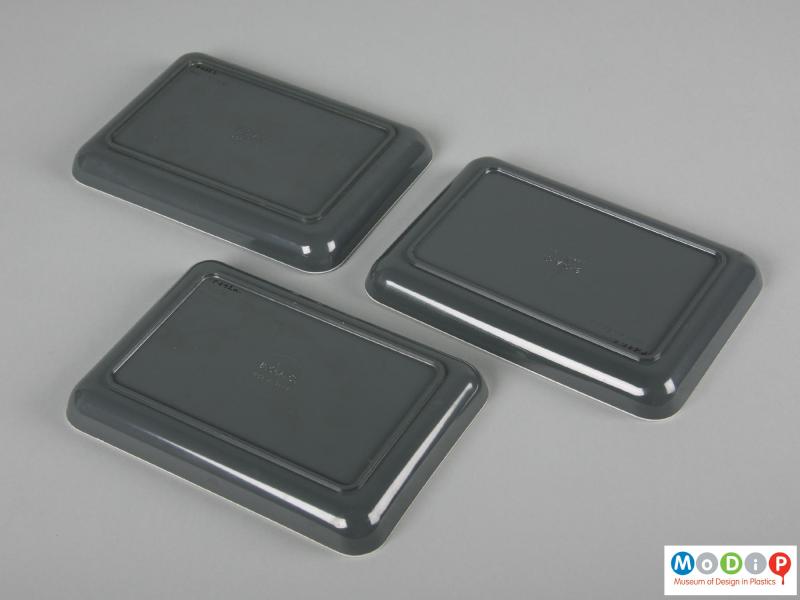 Underside view of a set of 3 BOAC plates showing the grey bases.