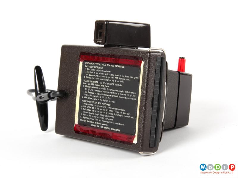 Rear view of a Polaroid camera showing the square back panel.