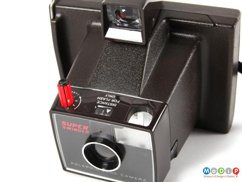 Top view of a Polaroid camera showing the dial controller.